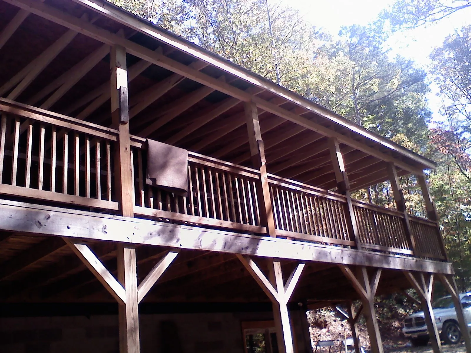 Timber framing under a new elevated porch and deck — Roof Leak Repair in Palomar Mountain by Roofing Brothers